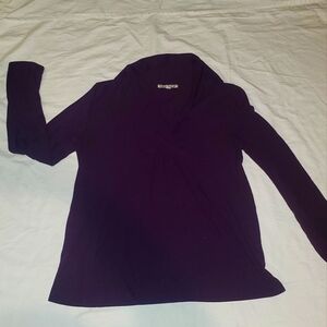Carolyn Taylor purple top, sweater